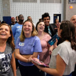 Simultaneous jumping high five, Guinness World Record attempt, at UMW Wednesday April 13, 2016. (Photo by Norm Shafer).