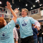 Simultaneous jumping high five, Guinness World Record attempt, at UMW Wednesday April 13, 2016. (Photo by Norm Shafer).