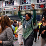 Simultaneous jumping high five, Guinness World Record attempt, at UMW Wednesday April 13, 2016. (Photo by Norm Shafer).