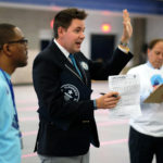 Simultaneous jumping high five, Guinness World Record attempt, at UMW Wednesday April 13, 2016. (Photo by Norm Shafer).