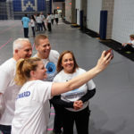 Simultaneous jumping high five, Guinness World Record attempt, at UMW Wednesday April 13, 2016. (Photo by Norm Shafer).