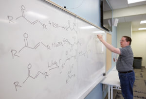 UMW Assistant Professor of Chemistry Davis Oldham leads a Friday morning session during the 2016 training camp for the International Chemistry Olympiad. The two-week camp brought 20 of the country's top teen chemists to UMW. (Photo by Norm Shafer).