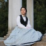 Laura posing in period costume.