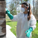 Historic Preservation students work on cleaning the Frank Lloyd Wright designed Pope Leighey house, Saturday April 11, 2015. (Photo by Norm Shafer).