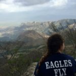 Ann Izzard enjoys the summit of a cloud-mountain peak in Panama.