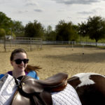 UMW students participate in the therapeutic horseback riding program at Hazelwild Farm. Photo by Reza A. Marvashti.