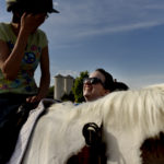 UMW students participate in the therapeutic horseback riding program at Hazelwild Farm. Photo by Reza A. Marvashti.