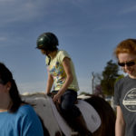 UMW students participate in the therapeutic horseback riding program at Hazelwild Farm. Photo by Reza A. Marvashti.