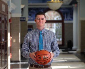 Photo of Taylor Johnson holding a basketball an Eagle MBA 4+1 Program student.