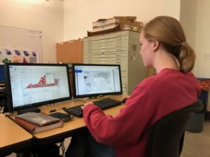 A student interpreting the geospatial landscape