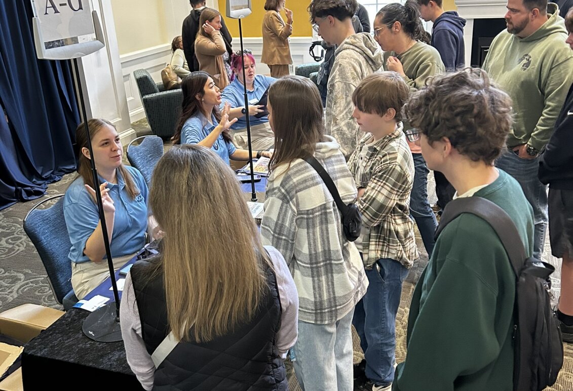Students and their families check in for Open House