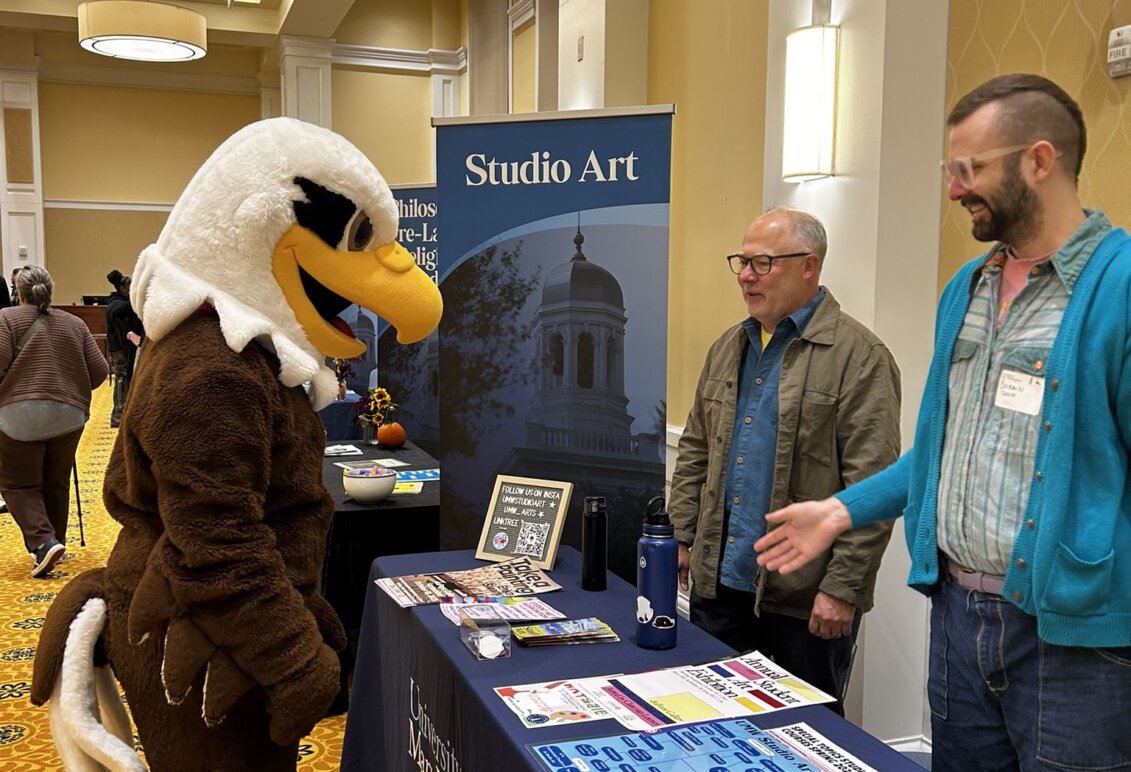 Sammy D. Eagle checks out the academic showcase