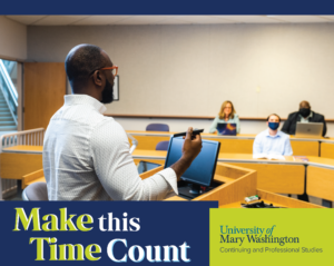 a professor teaching in a lecture hall with students