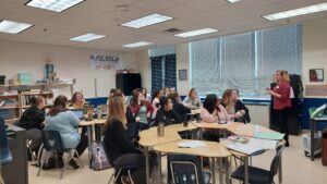 Teachers being lead in a professional development