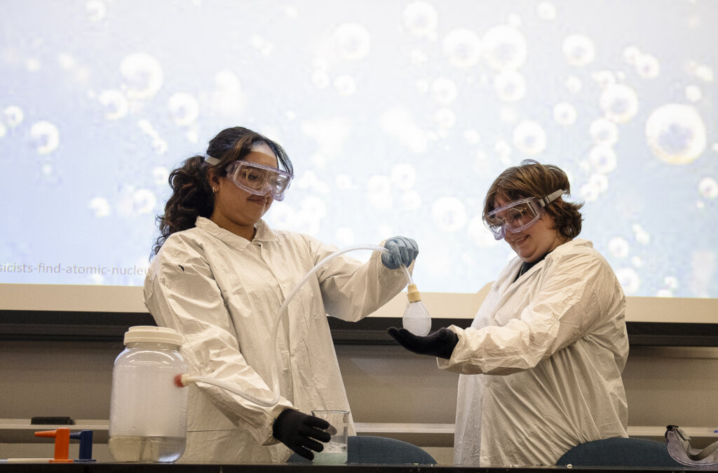 chemistry students doing an experiment