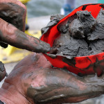 A core sample yields oyster specimens that are encapsulated in the estuarine mud.