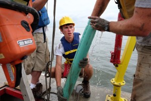 Miles Neilson operates the gravity coring system.