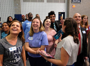 Simultaneous jumping high five, Guinness World Record attempt, at UMW Wednesday April 13, 2016. (Photo by Norm Shafer).