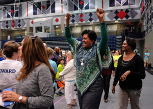 Simultaneous jumping high five, Guinness World Record attempt, at UMW Wednesday April 13, 2016. (Photo by Norm Shafer).