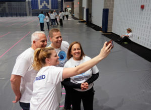 Simultaneous jumping high five, Guinness World Record attempt, at UMW Wednesday April 13, 2016. (Photo by Norm Shafer).