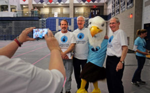 Simultaneous jumping high five, Guinness World Record attempt, at UMW Wednesday April 13, 2016. (Photo by Norm Shafer).