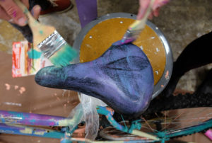 Students painting and decorating bikes in the sculpture studio, Wednesday Dec. 2, 2015. (Photo by Norm Shafer).