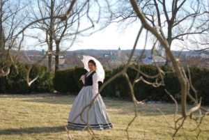 Laura posing in period costume.