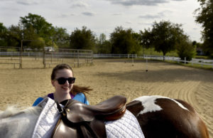 UMW students participate in the therapeutic horseback riding program at Hazelwild Farm. Photo by Reza A. Marvashti.