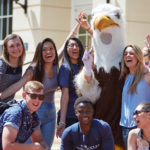 Students celebrating with Sammy D. Eagle