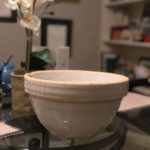 a large, beige ceramic bowl