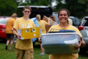 Student carrying boxes