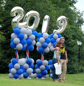 Student with 2019 balloons