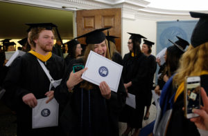 Michelle Michniak gives a shout at the conclusion of the UMW graduate school graduation, May 6, 2015. (Photo by Norm Shafer).