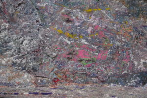 UMW Adjunct Professor of Art and Art History Christopher Mahonski blasted years of paint off of Spirit Rock to reveal its "color history."