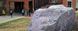 UMW Adjunct Professor of Art and Art History Christopher Mahonski blasted years of paint off of Spirit Rock to reveal its "color history."