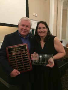 UMW Chief of Staff Martin A. Wilder Jr. poses with Coordinator of Community Events Ali Gauch Hieber, who presented Wilder's PCACAC Blackburn Award for excellence in college admissions ethics.