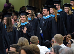 Master's Degree Candidates Process in Dodd Auditorium.