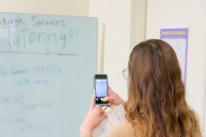 UMW students do a scavenger hunt to find principles of Universal Design for Learning (UDL) on campus. Photo by Jarred Cannon.
