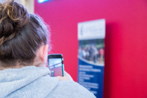 UMW students do a scavenger hunt to find principles of Universal Design for Learning (UDL) on campus. Photo by Jarred Cannon.