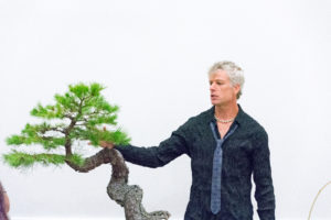 Todd Stewart (left) and Bob Chilton, owners of Gardens Unlimited, share expertise on bonsai at Mary Washington. The two designed UMW's new Zen garden, set to open by spring. Photo by Jarred Cannon.