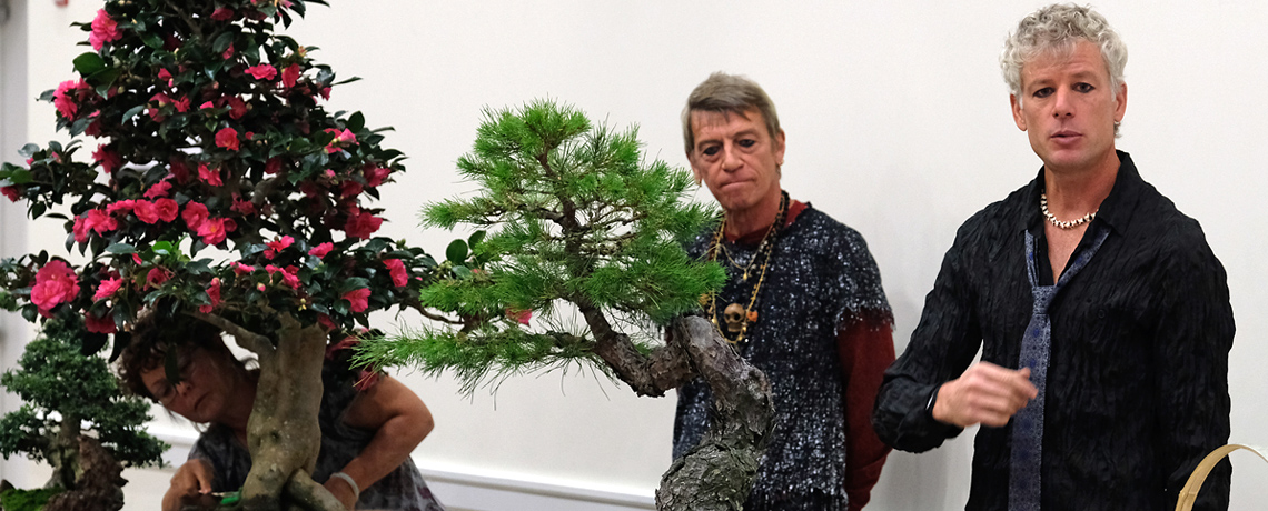 Todd Stewart (left) and Bob Chilton, owners of Gardens Unlimited, share expertise on bonsai at Mary Washington. The two designed UMW's new Zen garden, set to open by spring. Photo by Norm Shafer.