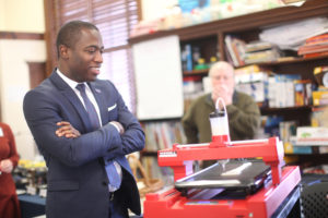 Mayor Stoney views student demonstration as Professor George Meadows looks on.