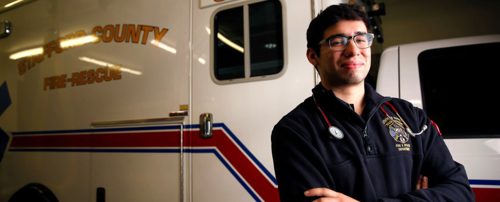 UMW junior Matt Tovear, a biochemistry major involved in promising oncology research, also works at a Stafford County EMT. Photo by Suzanne Carr.