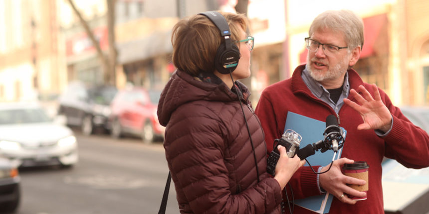 UMW Professor of Geography Steve Hanna is interviewed by the With Good Reason radio station. The show airs locally on Sunday. Photo by Karen Pearlman.