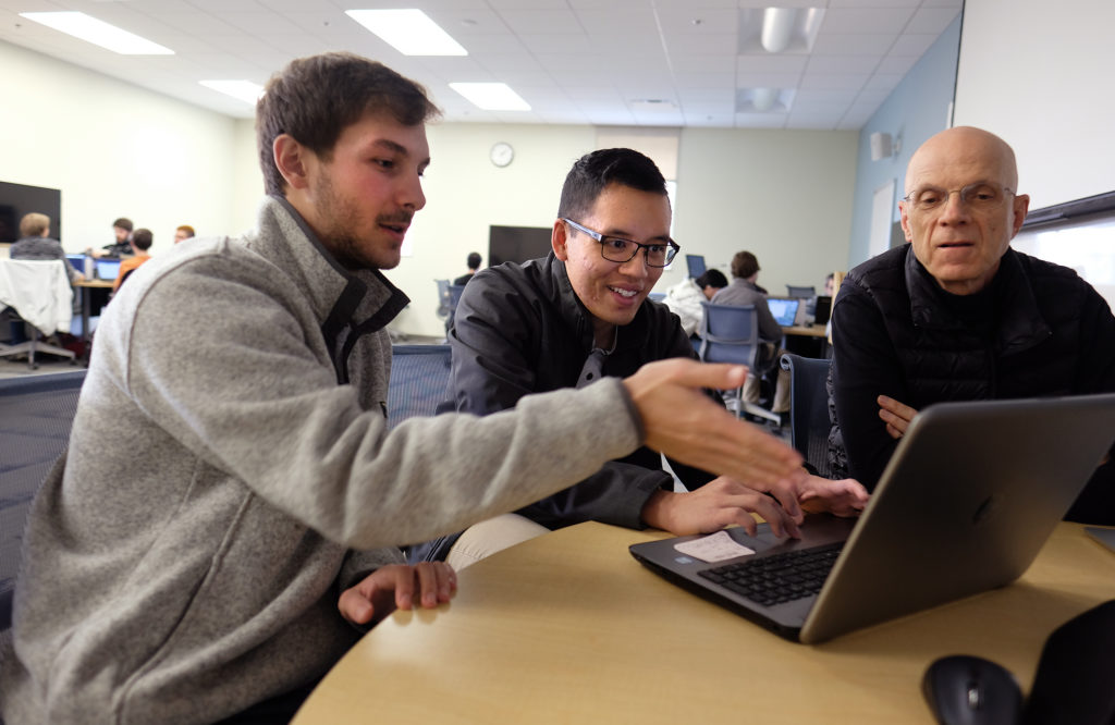 Computer science students push digital limits with Associate Professor Ron Zacharski.