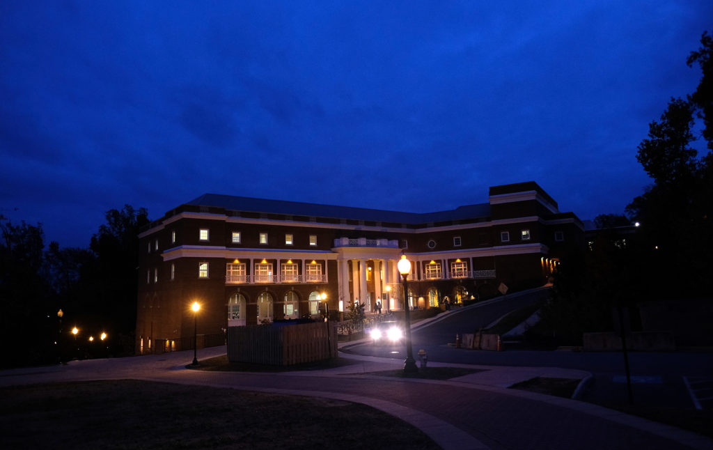 On their way to nighttime activities, students pass a lit-up Hurley Convergence Center, UMW’s 72,000-square-foot hub of media and technology. 