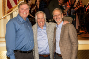 From left, Bartram, Winkler and UMW President Troy Paino , shown here during rehearsals, shared the stage during the Philharmonic season finale. Photo by Norma Woodward.