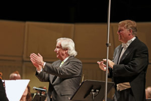 Special guest star Henry Winkler (left) shares the stage with UMW Philharmonic Orchestra Director Kevin Bartram during the group's 2017-18 season finale. Photo by Norma Woodward.