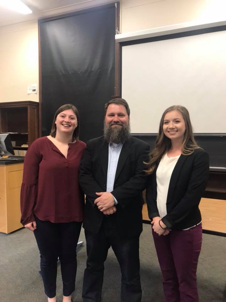 Bailey Stewart ’18 (left) and Shannon Haley ’18 (right) pose with UMW Professor of Mathematics Randall Helmstutler.
