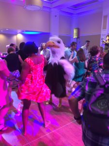 Alumni share the dance floor with Sammy D. Eagle during the Reunion Weekend All-Class Party.